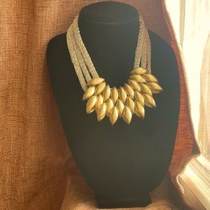 Unique golden golden statement piece lightweight yet extravagant